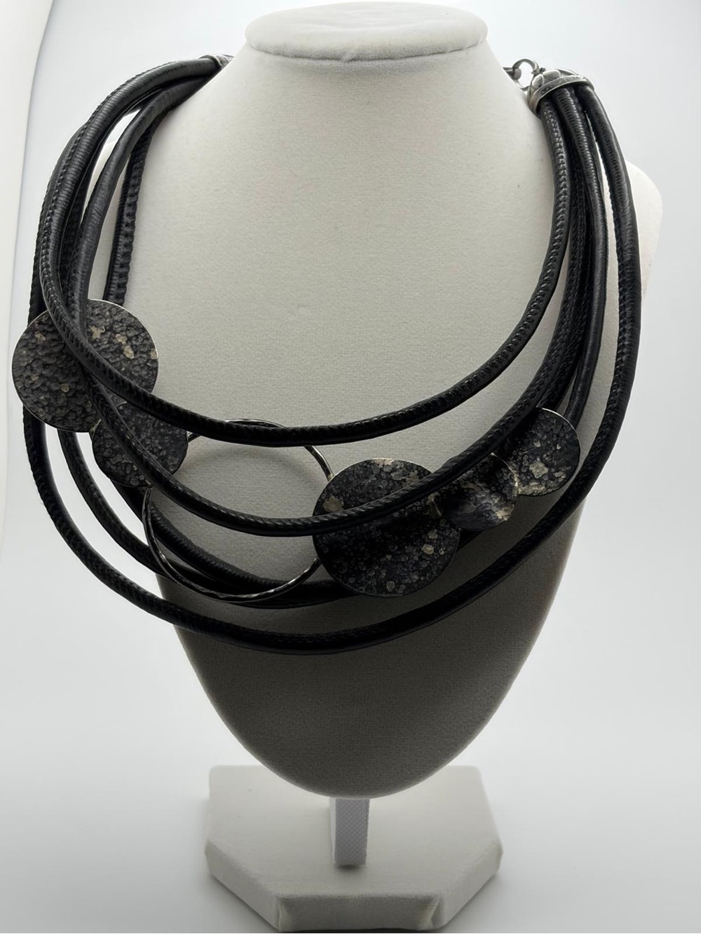 Layered Black Statement Necklace with Textured Disc Accents